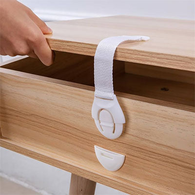 bloque porte blanc sangle bouton-pression main adulte tire tiroir bois