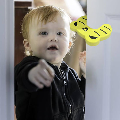 bloque porte forme papillon jaune bébé noir pointe dessus porte