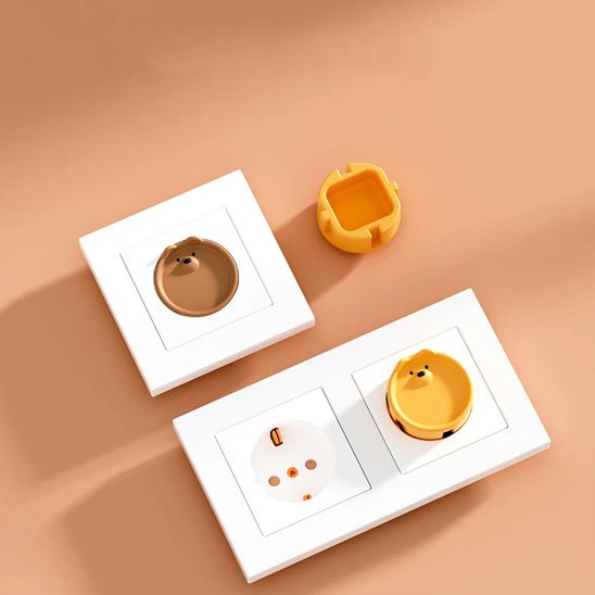 cache-prise-forme-visage-ours-3-pièces-1-marron-2-jaune-2-cache-branché-sur-prise-électrique