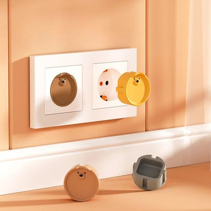 cache-prise-forme-visage-ours-4-pièces-4-couleurs-différents-1-cache-branché-sur-prise-électrique