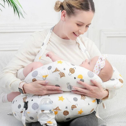 coussin d'allaitement forme espace maman souriante allaitant bébé motif planètes