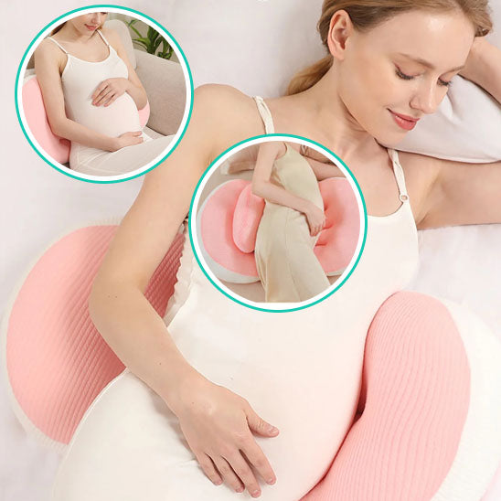 coussin de grossesse rose femme allongée mains ventre soutien lombaire