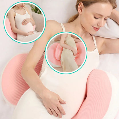 coussin de grossesse rose femme allongée mains ventre soutien lombaire