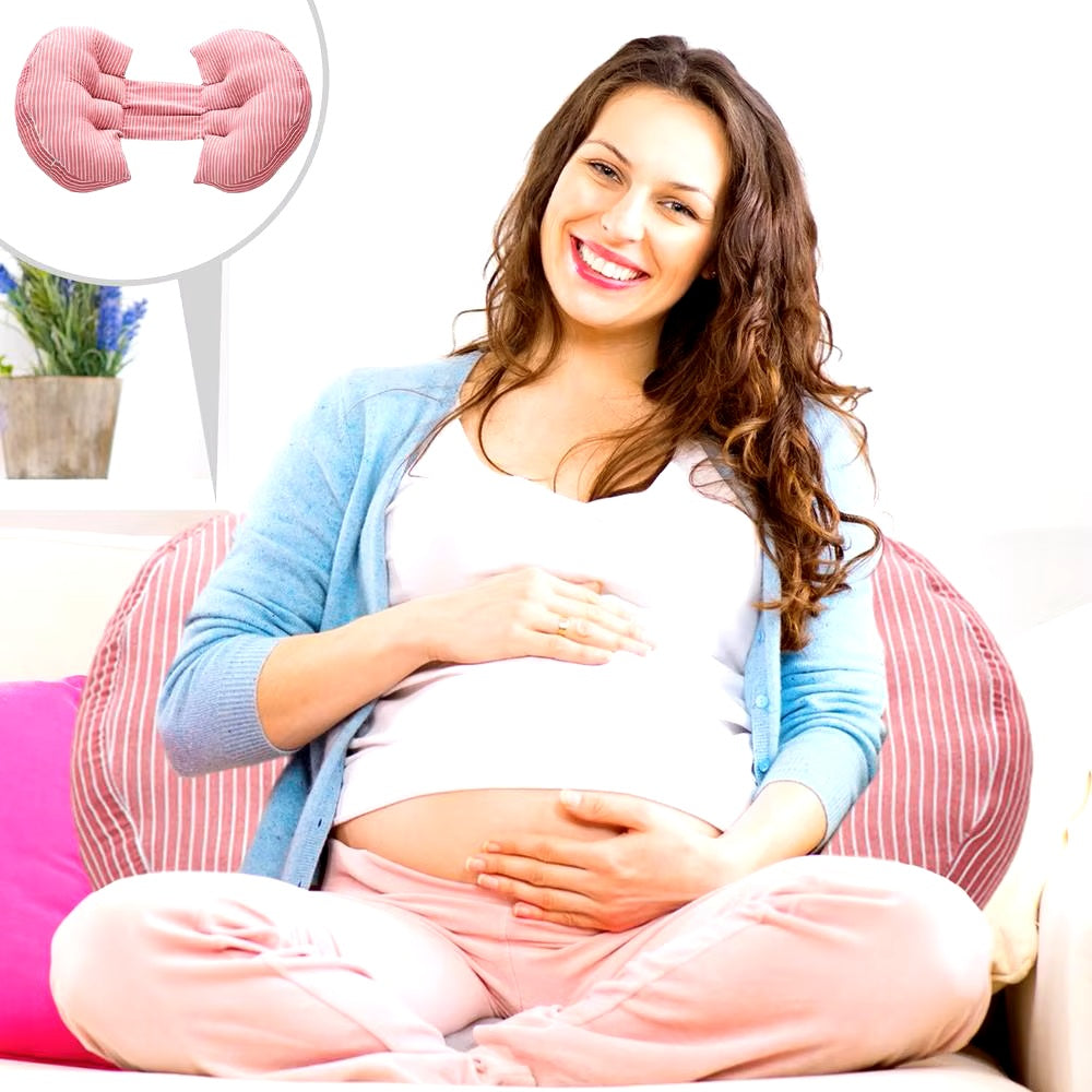 coussin de grossesse rose femme enceinte assise souriante confort