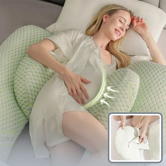 coussin de grossesse vert femme enceinte allongée soutien